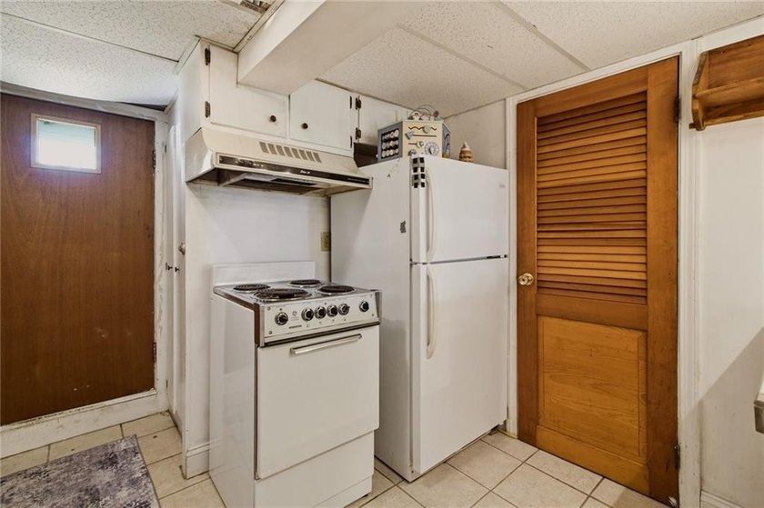 Tucked away on a quiet street and backing directly onto the open - photo 29