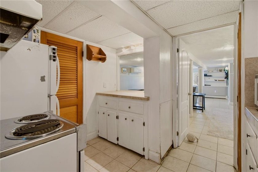 Tucked away on a quiet street and backing directly onto the open - photo 31