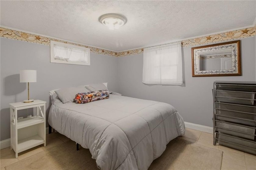 Tucked away on a quiet street and backing directly onto the open - photo 32