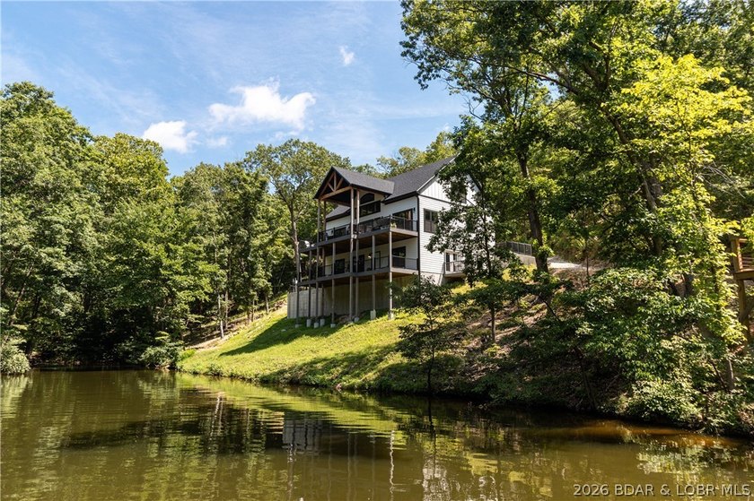 Experience the best of lakefront living at the 1-mile marker in - photo 3
