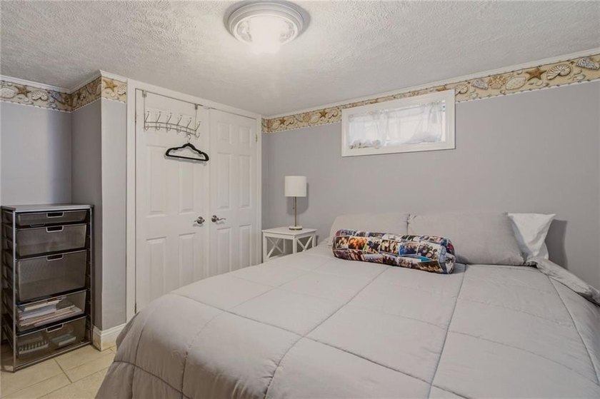 Tucked away on a quiet street and backing directly onto the open - photo 33