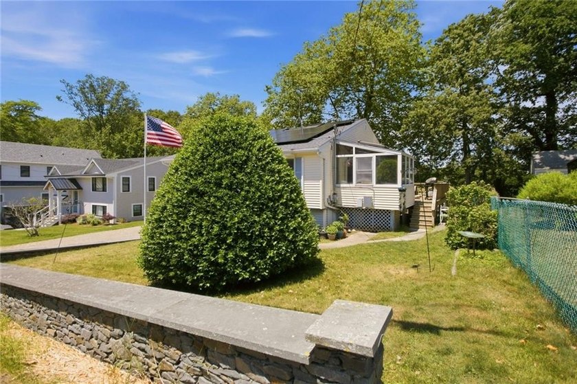 Tucked away on a quiet street and backing directly onto the open - photo 35