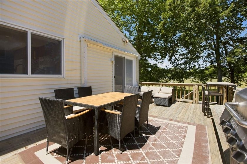 Tucked away on a quiet street and backing directly onto the open - photo 36