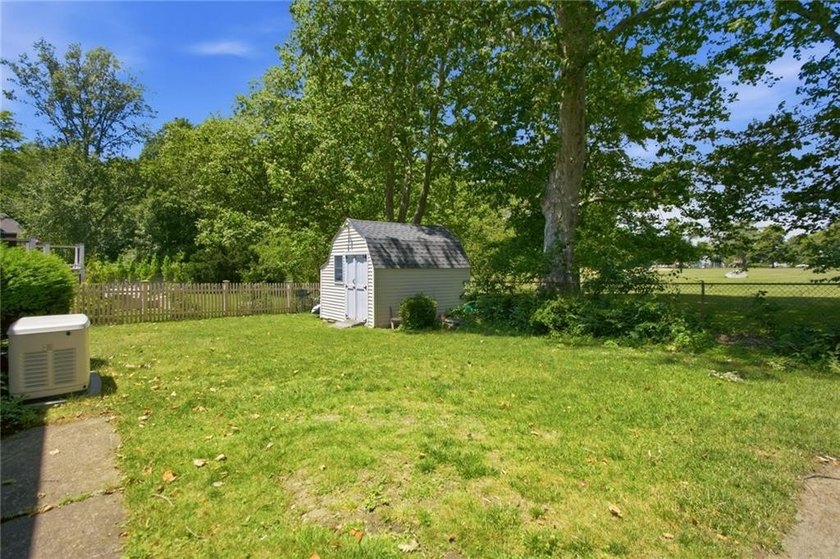 Tucked away on a quiet street and backing directly onto the open - photo 38