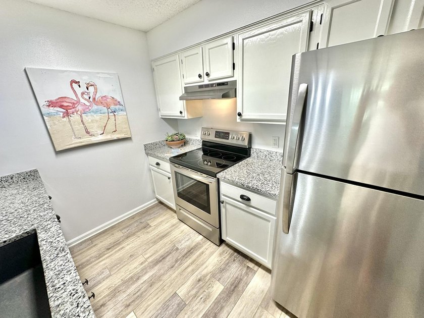 Welcome to this turnkey third-floor condominium with all the - photo 4