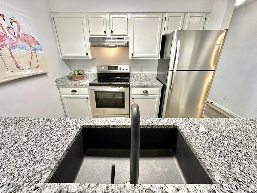 Welcome to this turnkey third-floor condominium with all the - photo 7