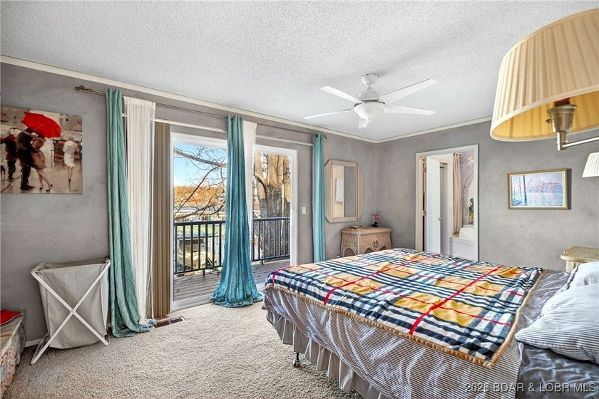 Lake life doesn't get easier-or cozier-than this. This two-story - photo 3