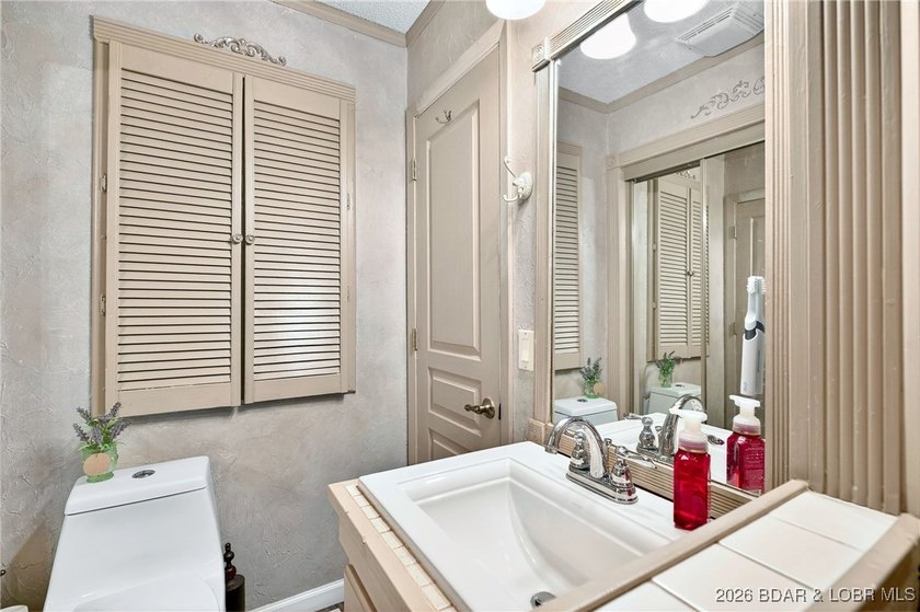 Lake life doesn't get easier-or cozier-than this. This two-story - photo 8