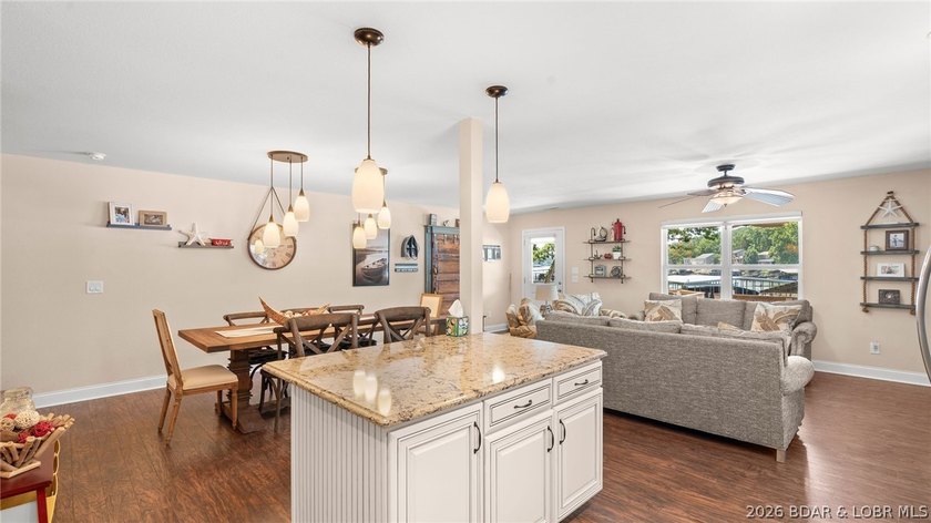 Designed with gathering in mind, this unique lake home was - photo 11