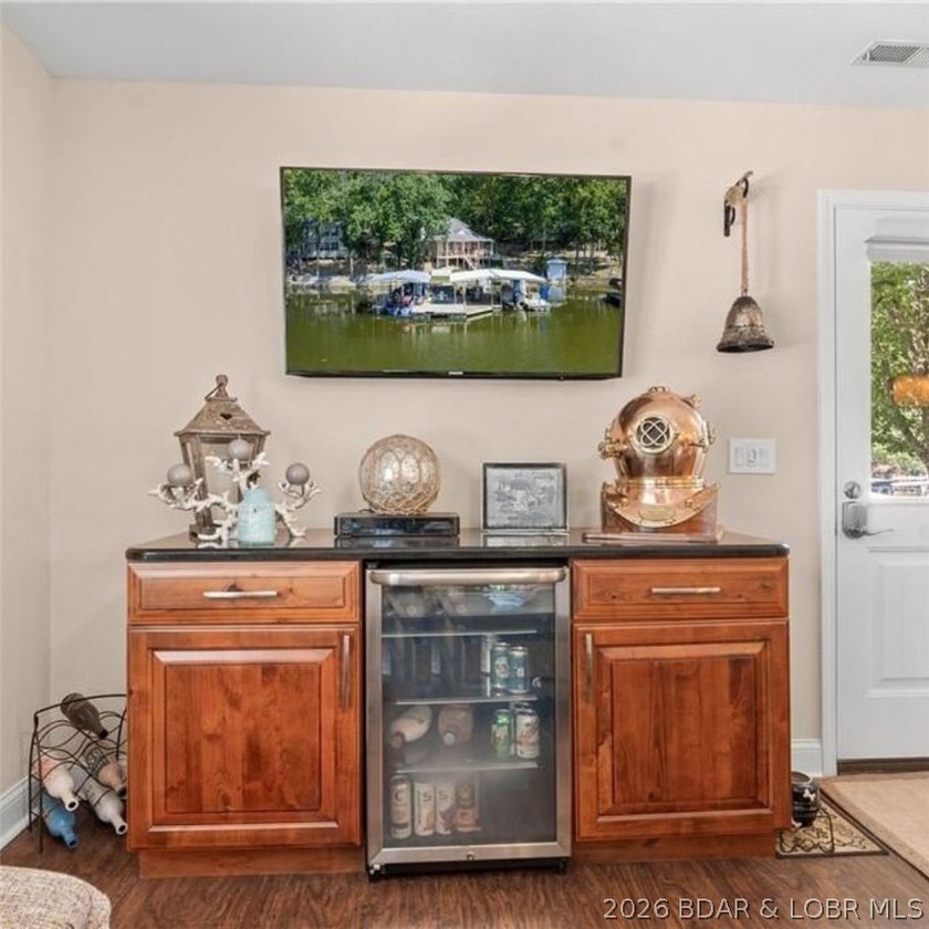 Designed with gathering in mind, this unique lake home was - photo 23