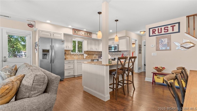 Designed with gathering in mind, this unique lake home was - photo 25