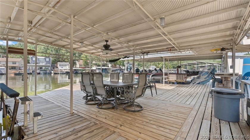 Designed with gathering in mind, this unique lake home was - photo 31
