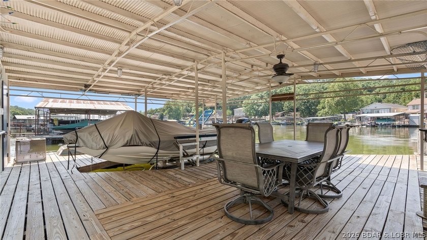 Designed with gathering in mind, this unique lake home was - photo 32