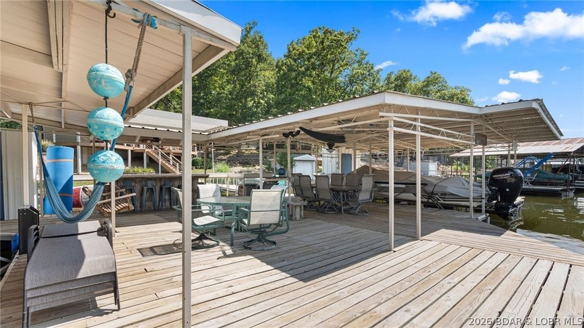 Designed with gathering in mind, this unique lake home was - photo 34