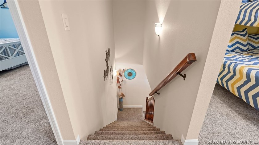 Designed with gathering in mind, this unique lake home was - photo 38