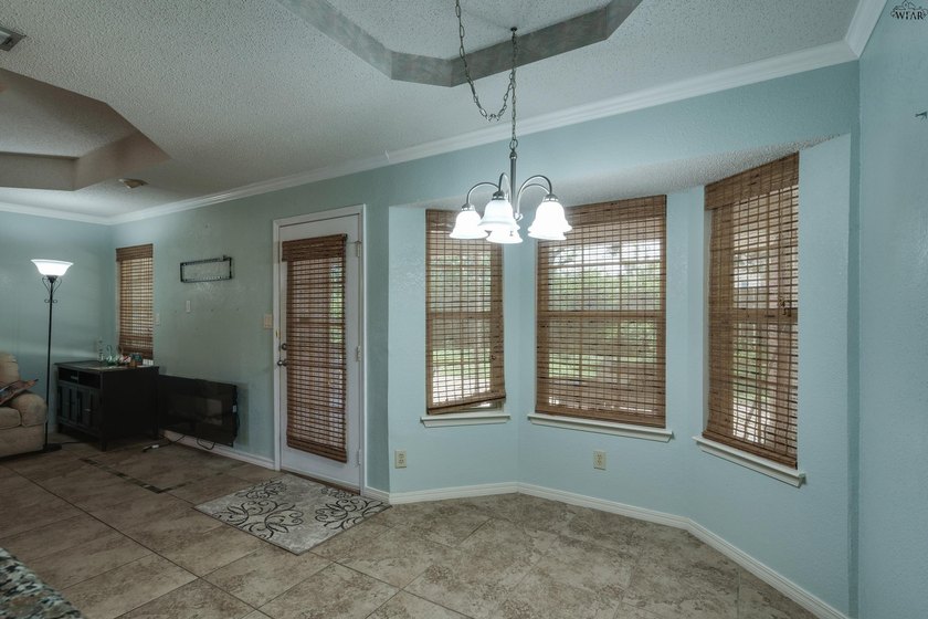 Welcome home to this updated Sikes Estates property featuring a - photo 10