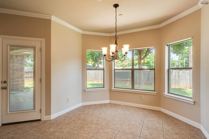 Beautifully designed home featuring freshly installed carpet - photo 9