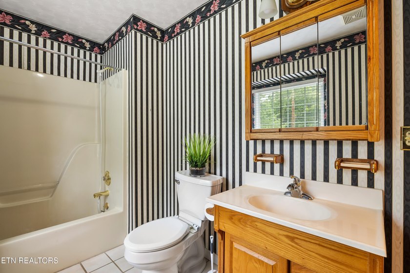 a charming cottage style home full of warmth, character, and - photo 25