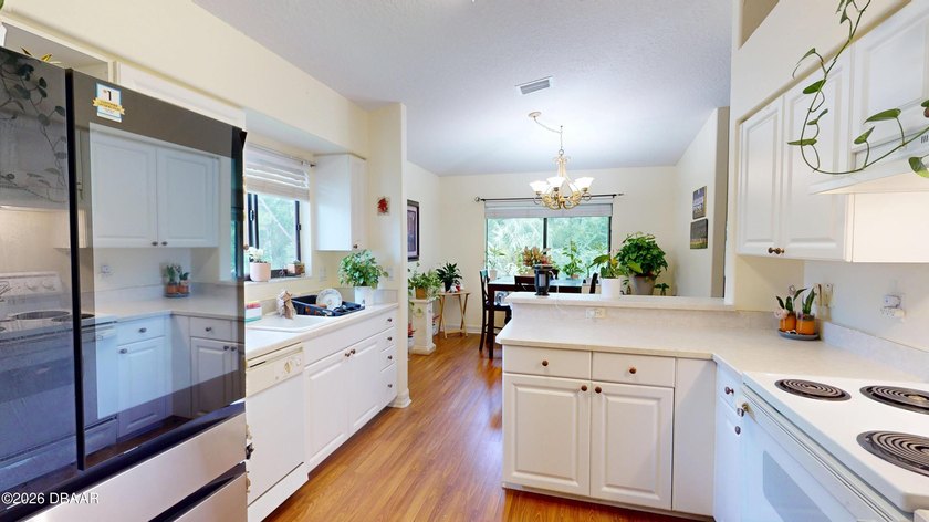 Welcome home to this beautifully maintained second-floor - photo 11