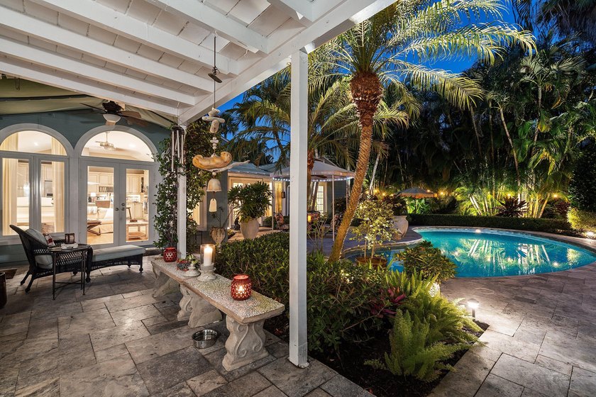 Tucked behind an arched gate on one of Palm Trail's most coveted - photo 11