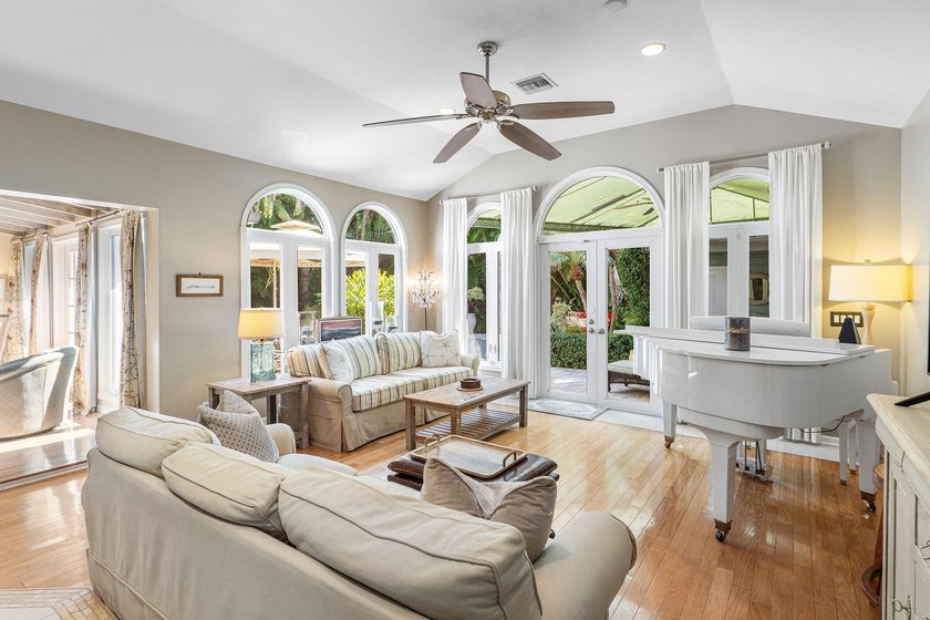Tucked behind an arched gate on one of Palm Trail's most coveted - photo 18