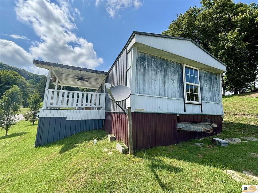 A budget-friendly mobile home on 0.27 acres inside city limits - photo 23