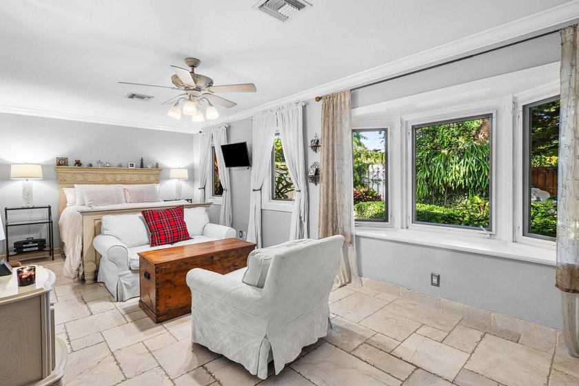 Tucked behind an arched gate on one of Palm Trail's most coveted - photo 26