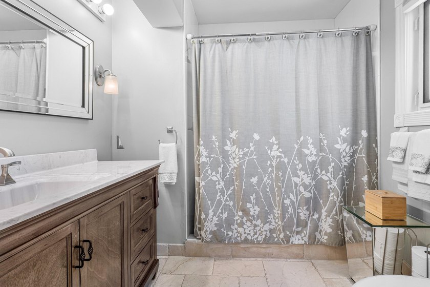 Tucked behind an arched gate on one of Palm Trail's most coveted - photo 29