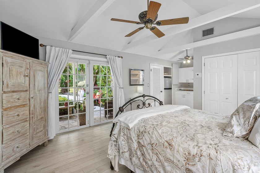 Tucked behind an arched gate on one of Palm Trail's most coveted - photo 37