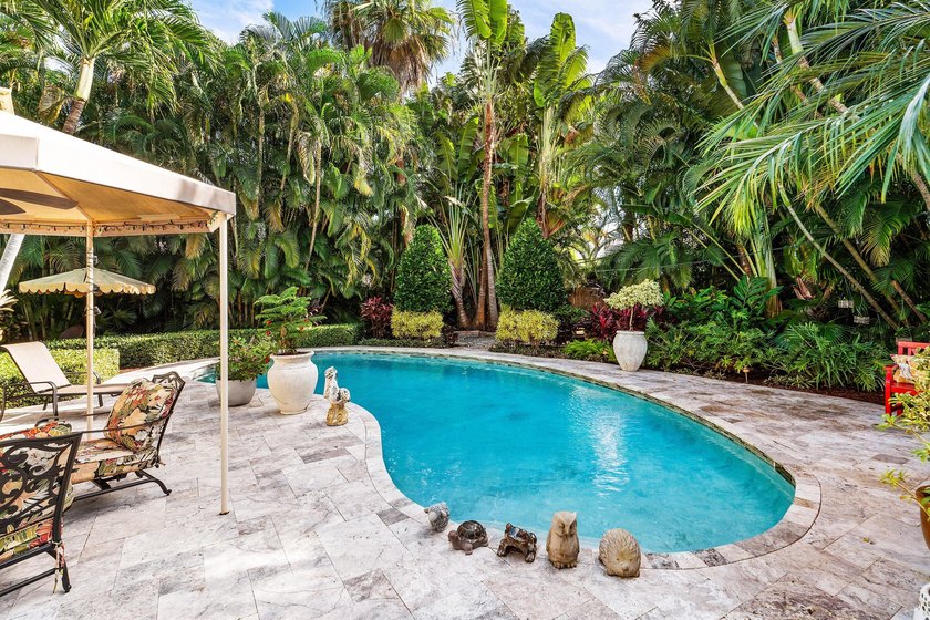 Tucked behind an arched gate on one of Palm Trail's most coveted - photo 43