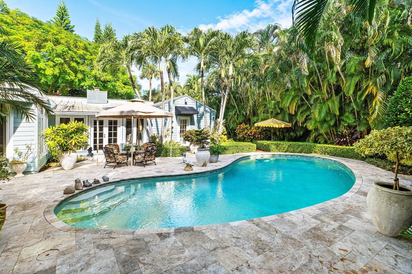 Tucked behind an arched gate on one of Palm Trail's most coveted - photo 44