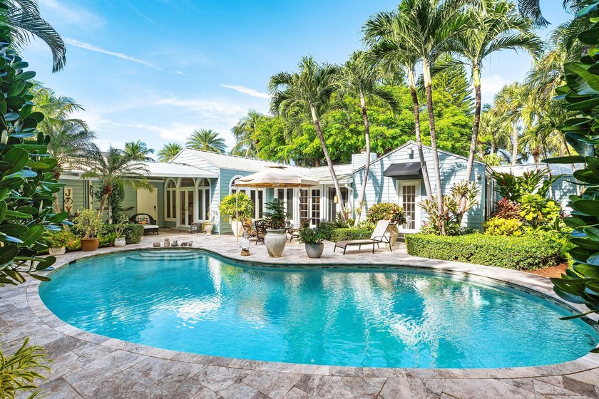 Tucked behind an arched gate on one of Palm Trail's most coveted - photo 45