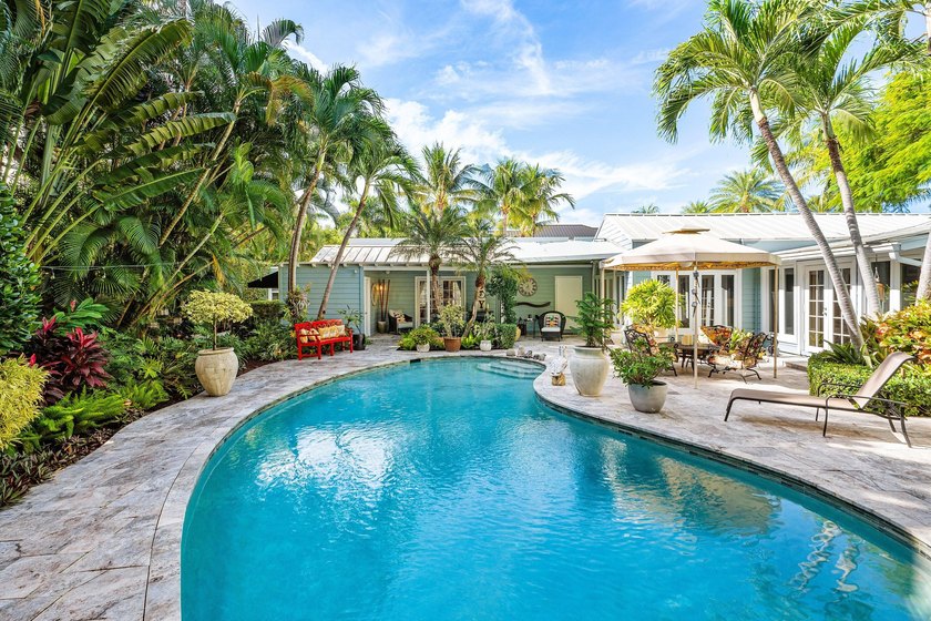 Tucked behind an arched gate on one of Palm Trail's most coveted - photo 46