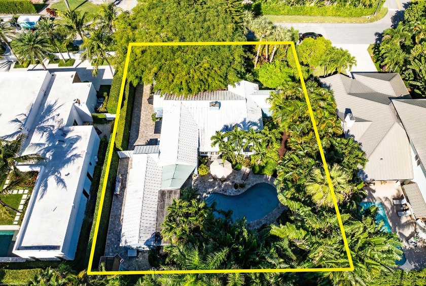 Tucked behind an arched gate on one of Palm Trail's most coveted - photo 47