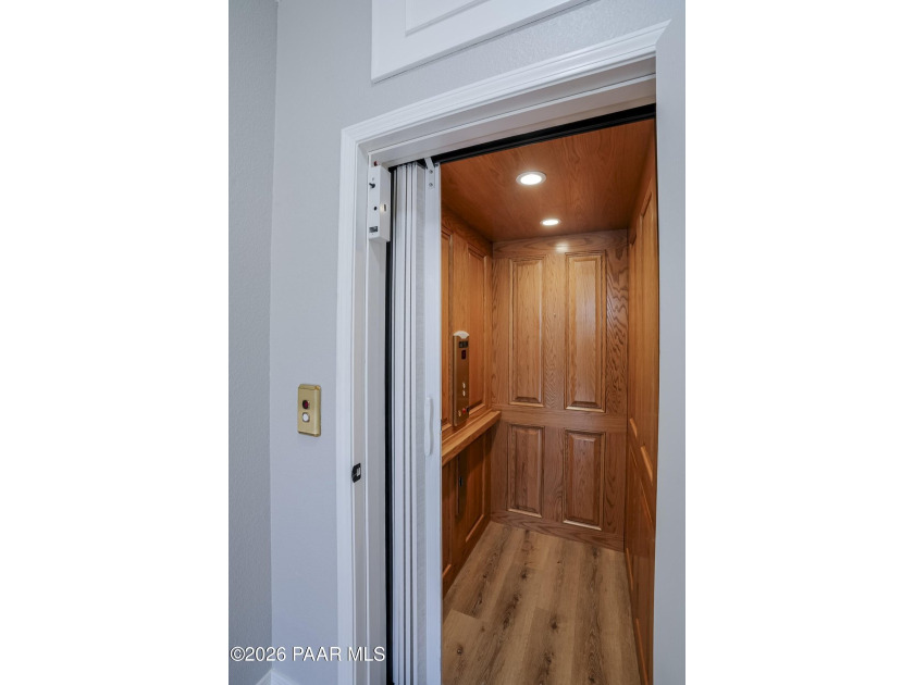 Experience elevated, low-maintenance living in the prestigious - photo 3