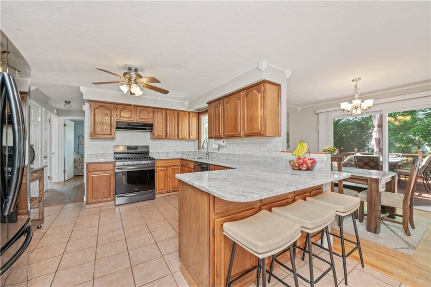 Welcome home to this beautifully maintained 4 bedroom, 2 full - photo 4