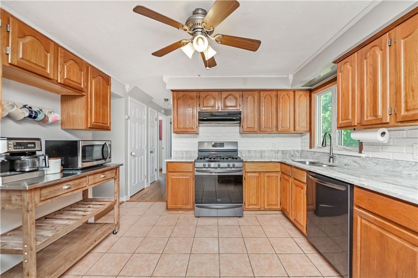 Welcome home to this beautifully maintained 4 bedroom, 2 full - photo 5