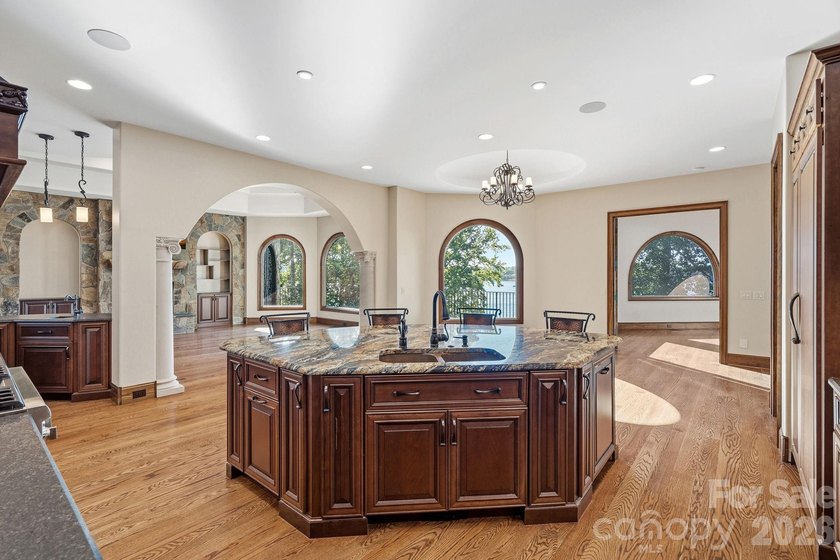 Where luxury meets the water's edge! This exquisite waterfront - photo 8
