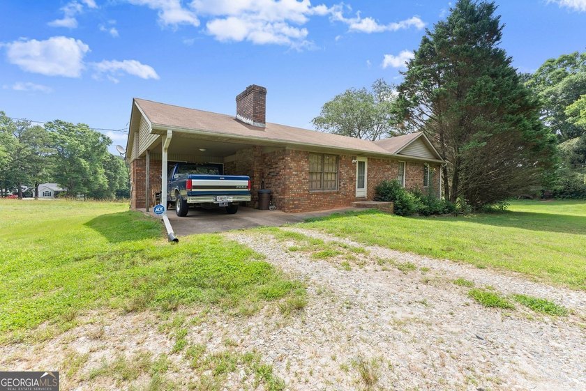 Discover the possibilities with this charming brick ranch - photo 6