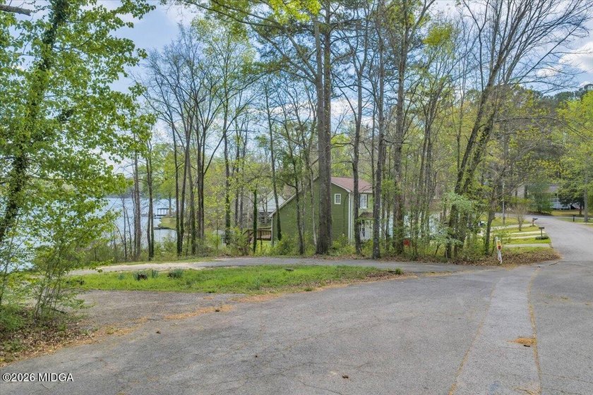 Discover a rare opportunity to own a premier lakefront homesite - photo 10