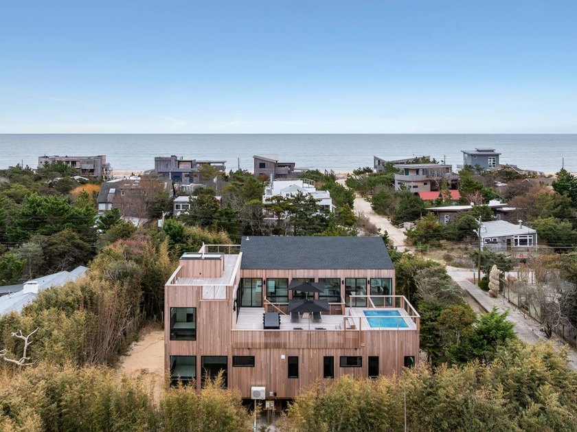 Discover the future of coastal living at this breathtaking new - photo 3