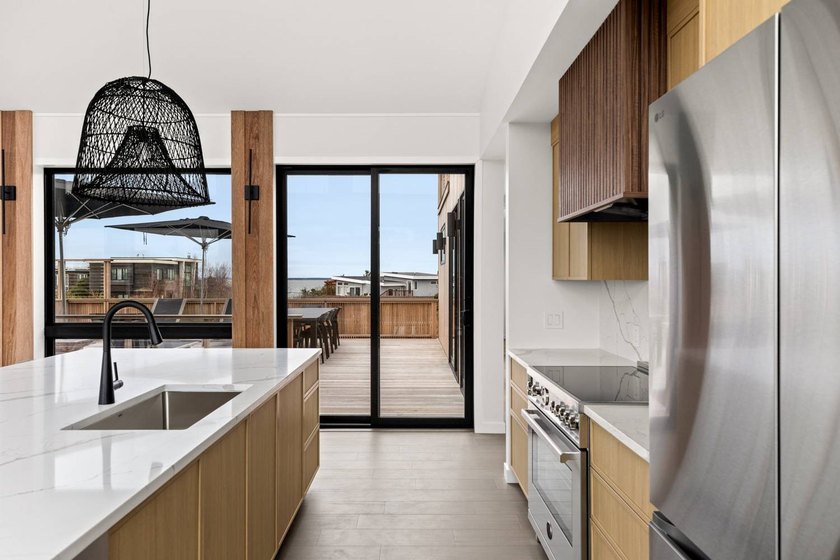 Discover the future of coastal living at this breathtaking new - photo 9