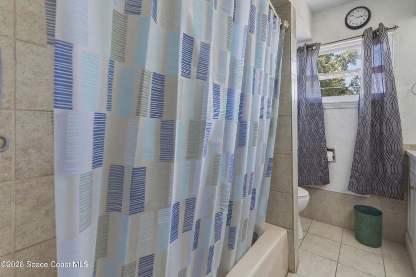 Welcome to this spacious 4-bedroom, 2.5-bath pool home located - photo 30