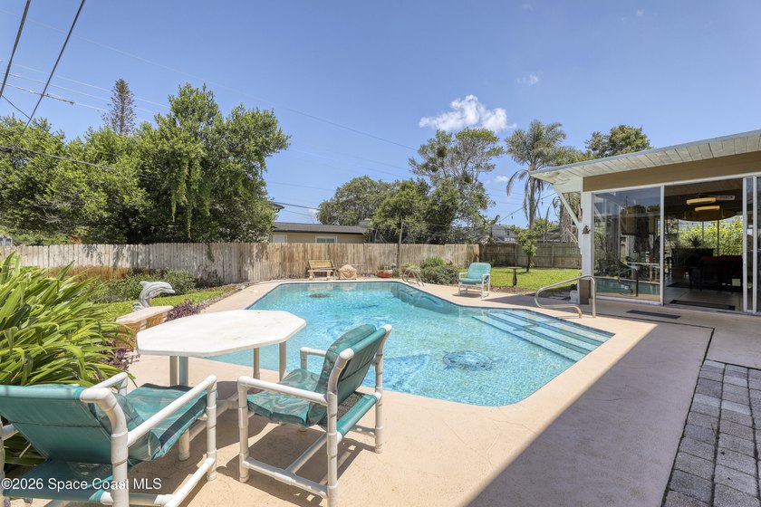 Welcome to this spacious 4-bedroom, 2.5-bath pool home located - photo 50
