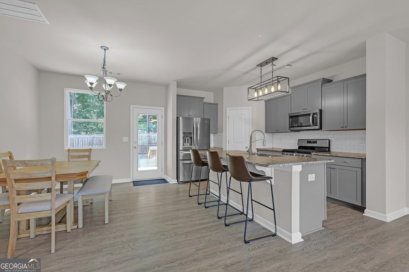 Welcome home to this like-new split-level beauty nestled on a - photo 11