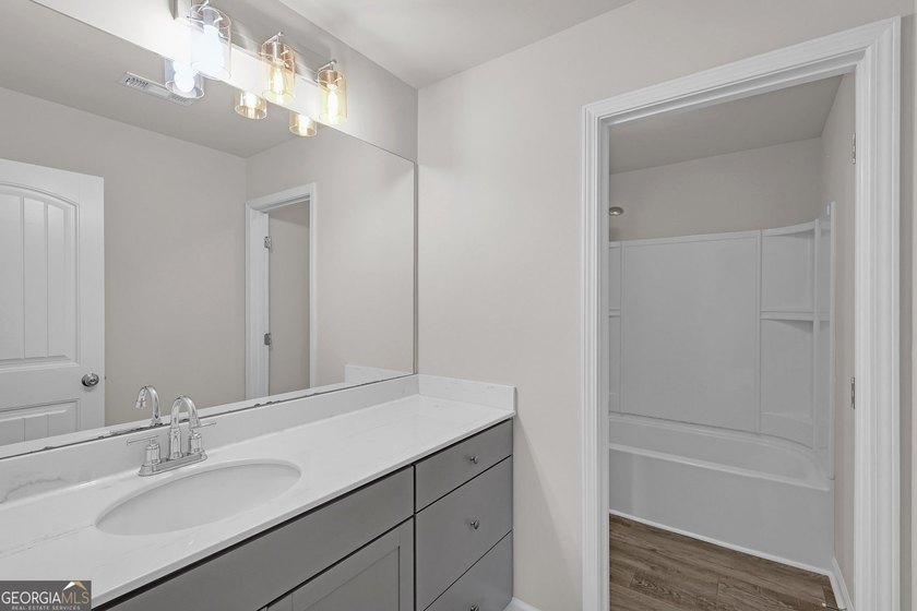 Welcome home to this like-new split-level beauty nestled on a - photo 27