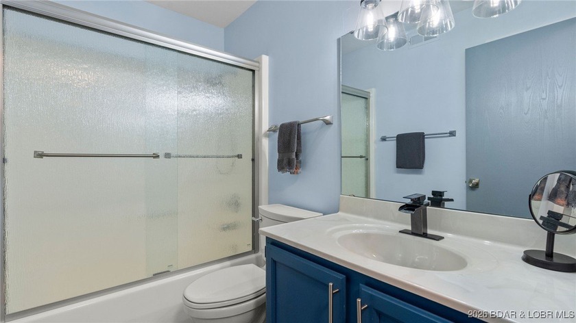 Motivated Seller!! Experience elevated lake living in this - photo 9