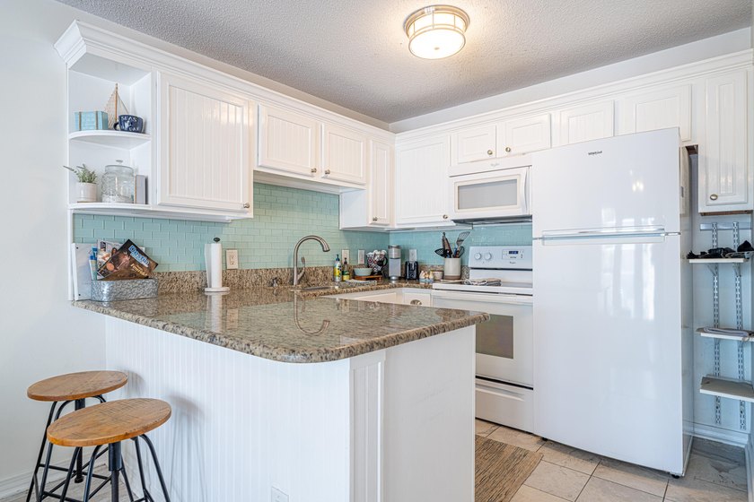***LOWEST PRICED CONDO IN THE BUILDING*** This perfectly located - photo 8