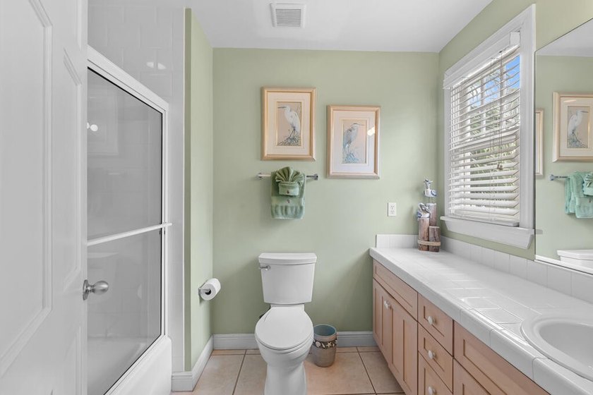 Beautifully appointed home that offers a charming backyard with - photo 13
