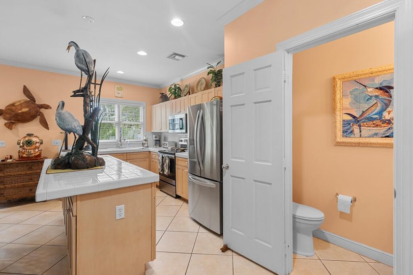 Beautifully appointed home that offers a charming backyard with - photo 21